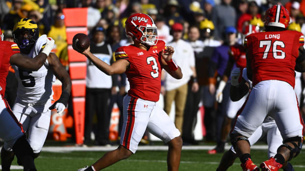 Nov 18, 2023; College Park, Maryland, USA; Maryland Terrapins quarterback Taulia Tagovailoa (3) throws a pass against the Michigan Wolverines during the first half at SECU Stadium. Mandatory Credit: Brad Mills-USA TODAY Sports  